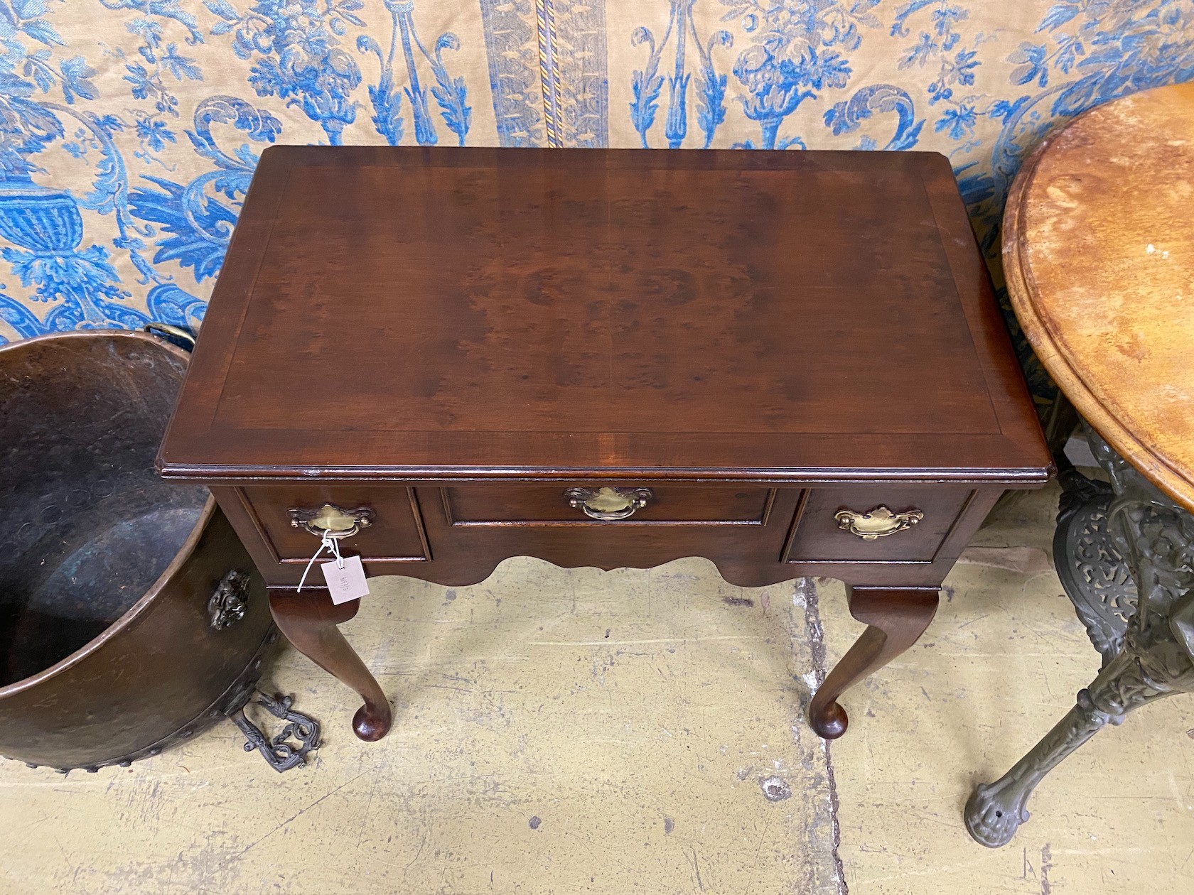 A reproduction George III style mahogany lowboy, width 72cm, depth 42cm, height 75cm